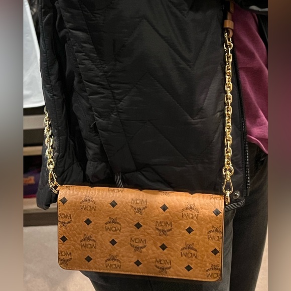 MCM Handbags - MCM-NWT- Aren Crossbody Wallet in Visetos/ Color is Cognac. Size - Large